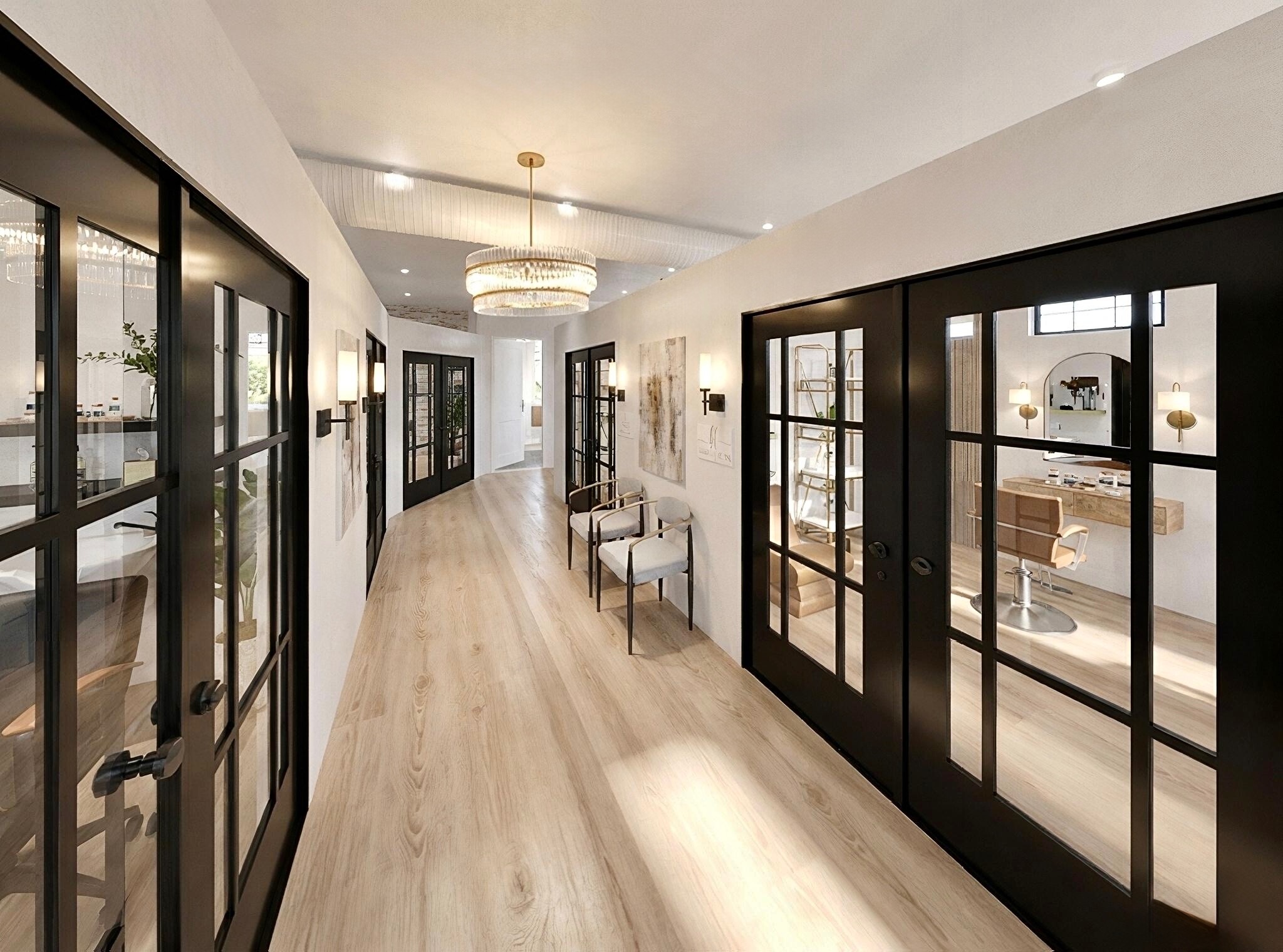 Interior corridor with glass-front private suites