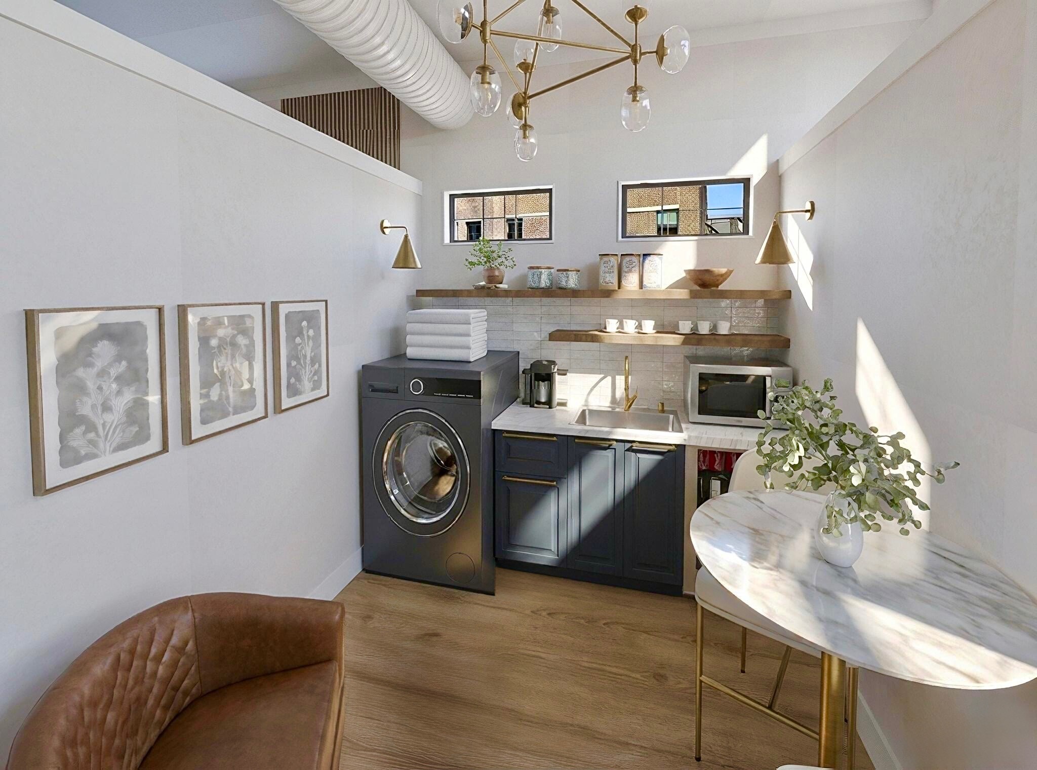 Breakroom and on-site laundry with washer, coffee bar, microwave, refrigerator, storage and seating